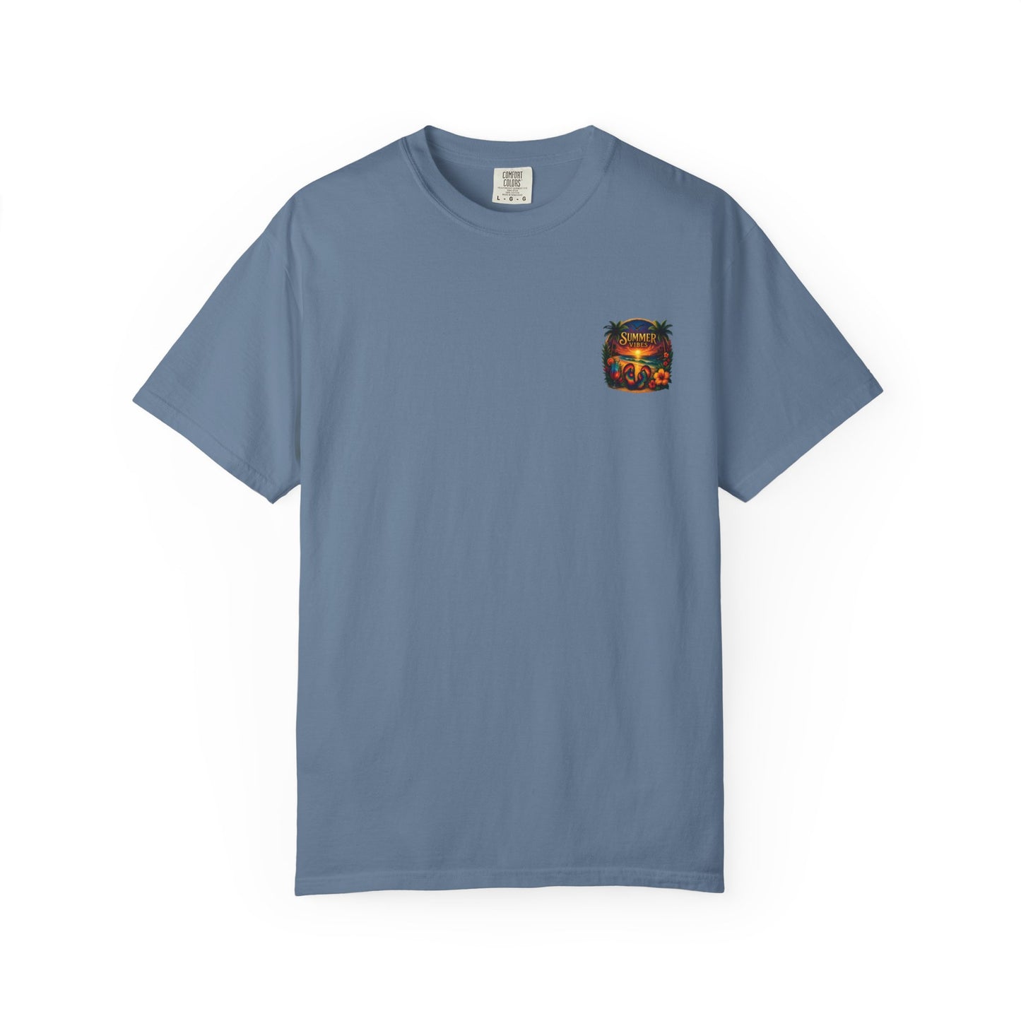 Blue graphic tee with summer vibes featuring a small colorful sunset and palm tree design on chest