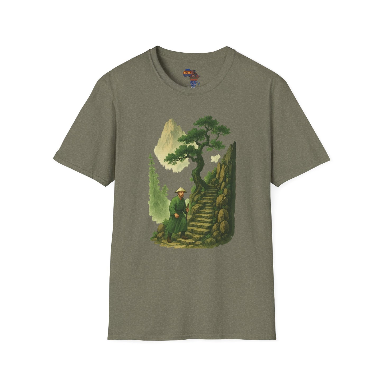 Mashafrica-style olive green T-shirt with mountain print clothing design featuring a man walking up stone stairs in a scenic mountain setting